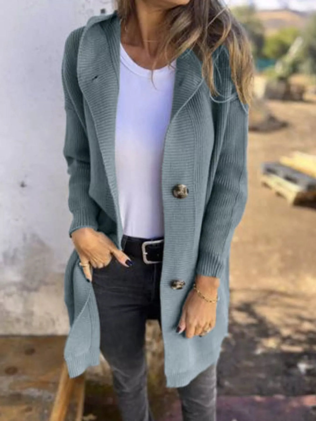 Sage hooded button front cardigan worn with black jeans and a white tee