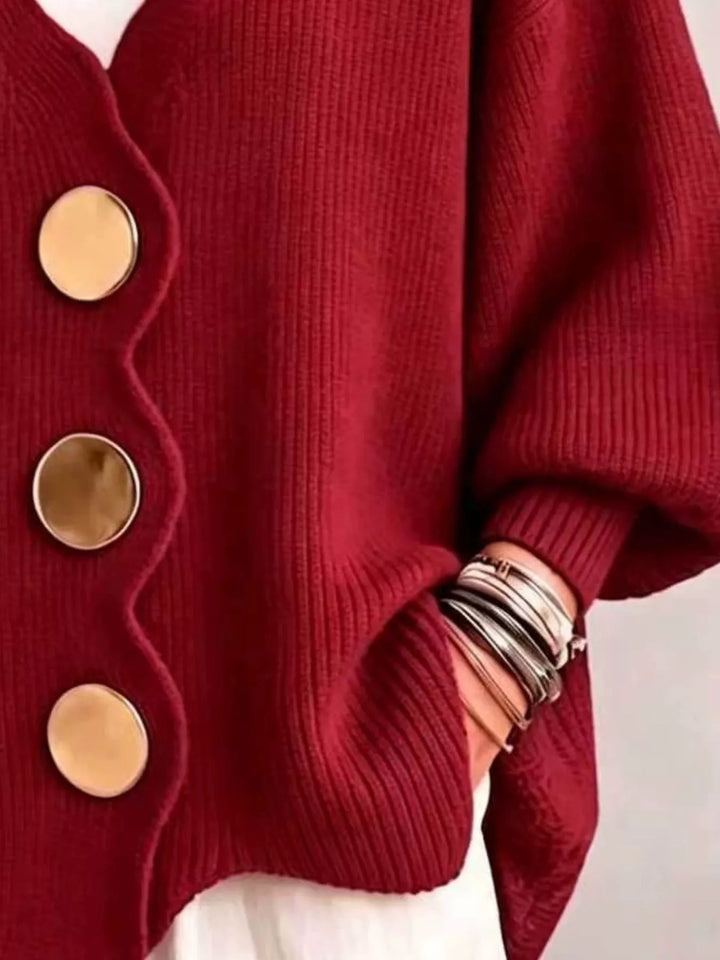Red cardigan button front and scalloped hem, hand in pocket detail