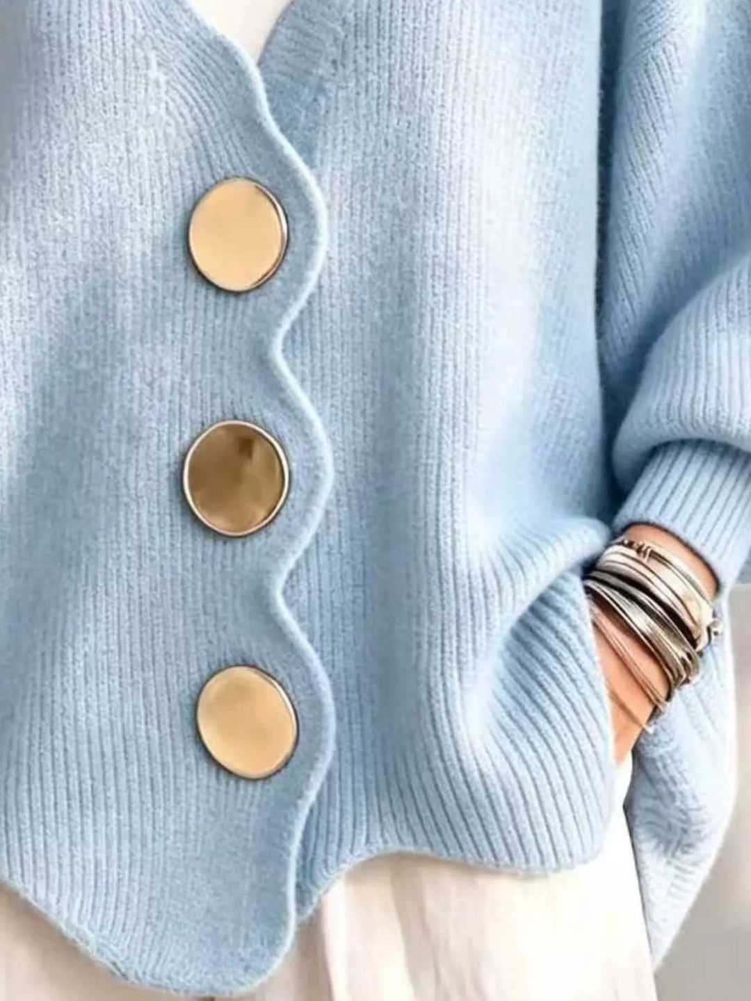 Sky blue cardigan button front and scalloped hem, hand in pocket detail
