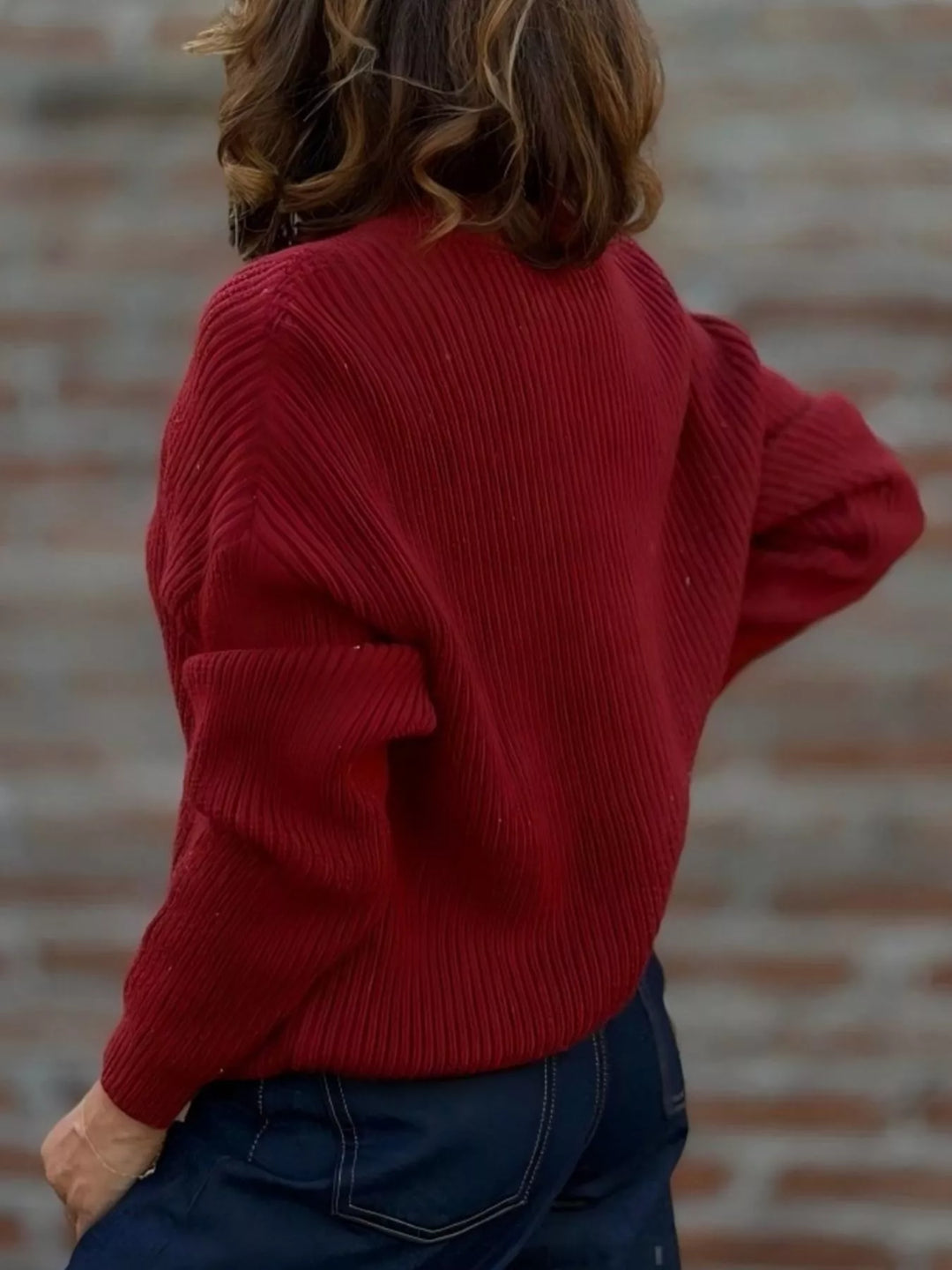 Back view of the burgundy ribbed knit cardigan
