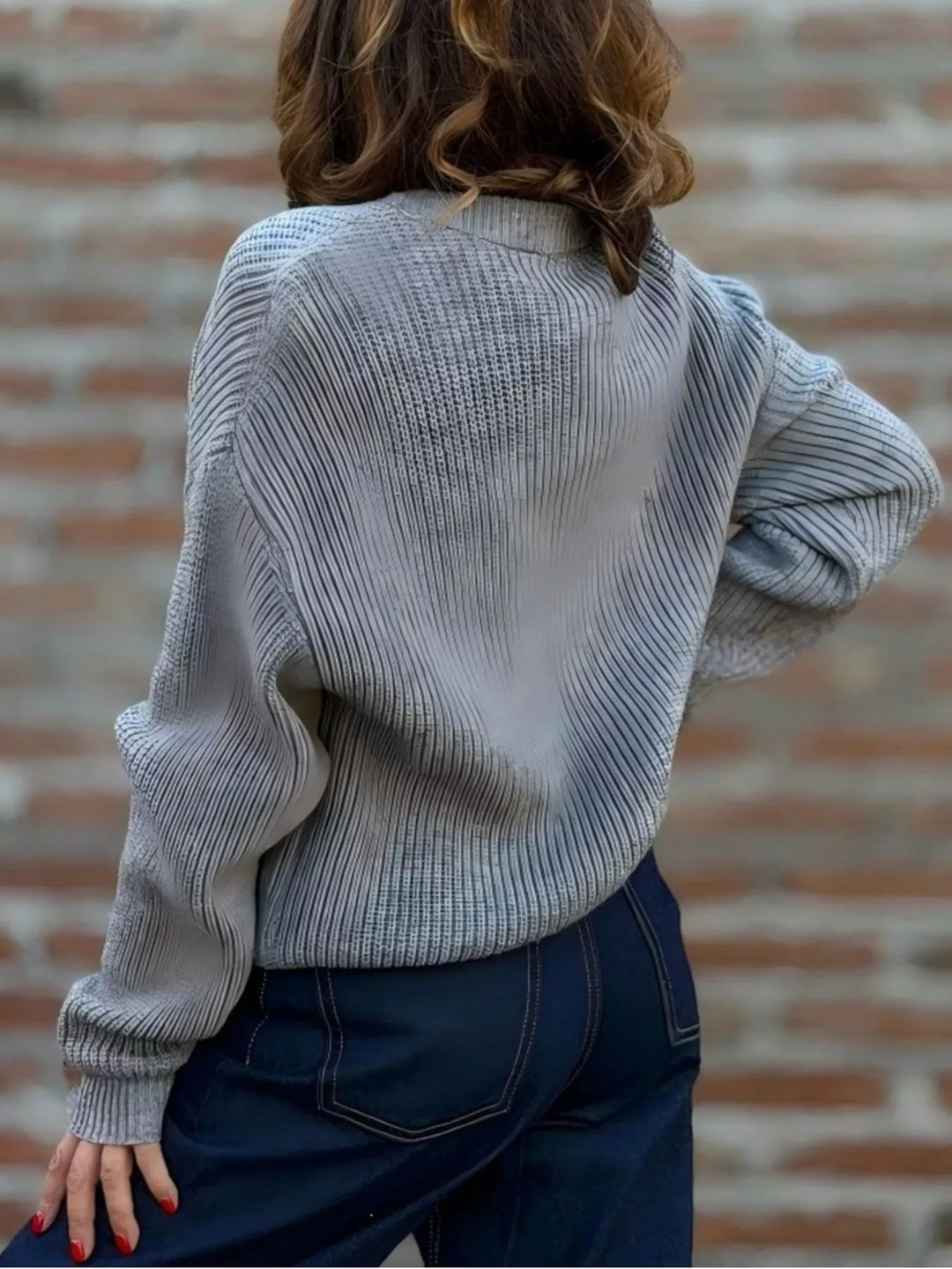 Back view of the gray ribbed knit cardigan