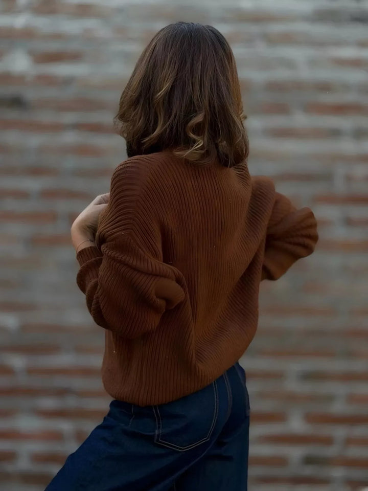 Back view of the rust brown ribbed knit cardigan