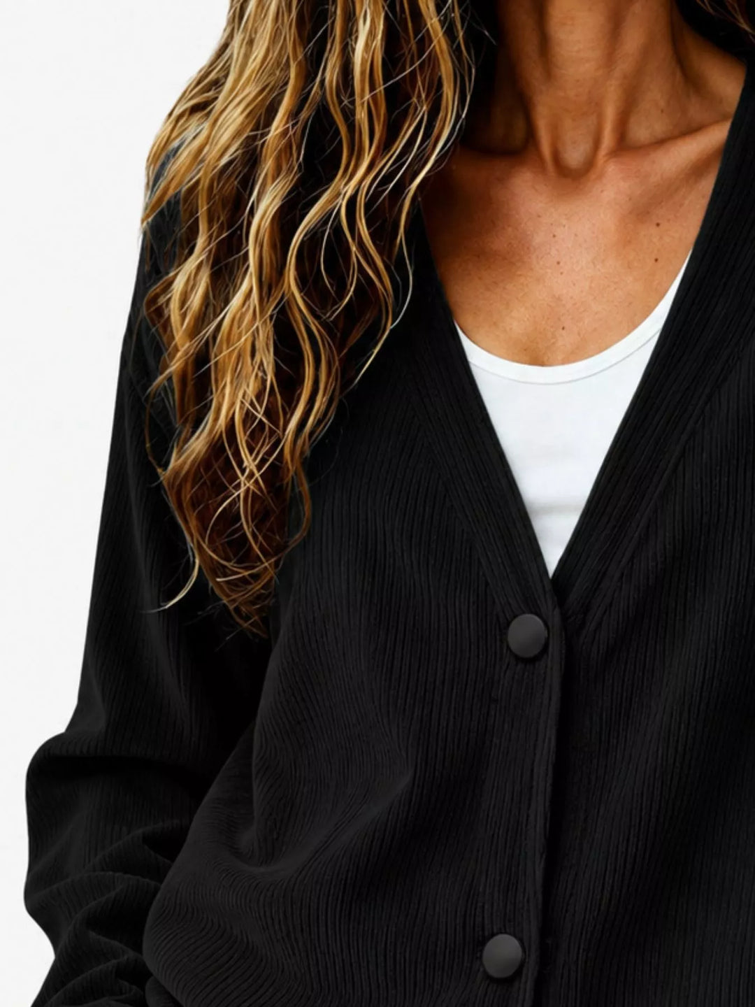 Corduroy-look ribbed v-neck button up in black, close-up detail