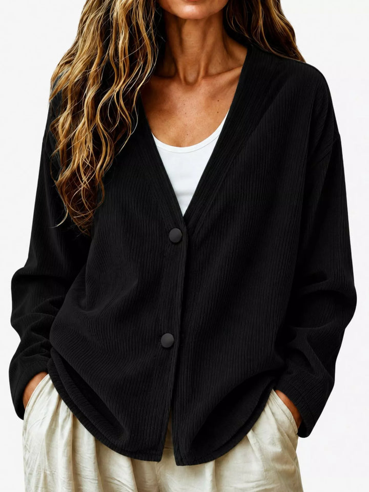 Corduroy-look ribbed v-neck button up in black, front view