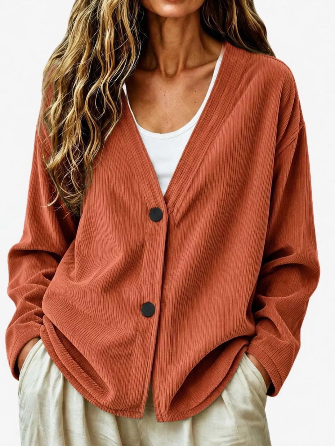 Corduroy-look ribbed v-neck button up in terracotta, front view