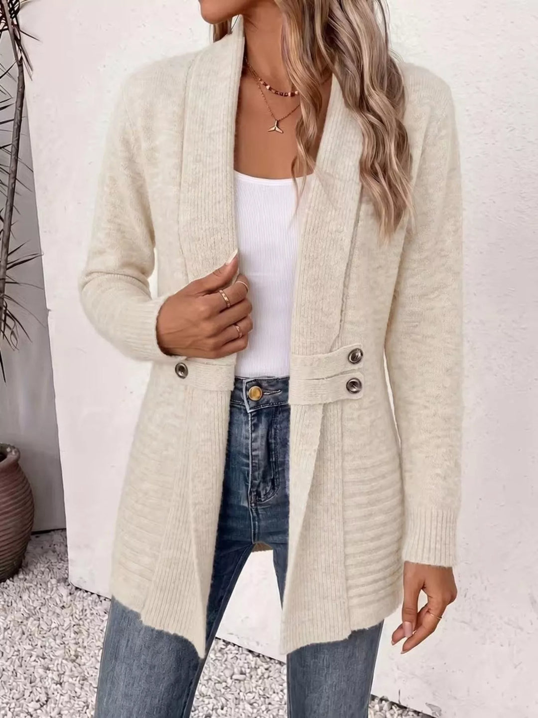 Shawl collar open front waist band in ivory, styled on model