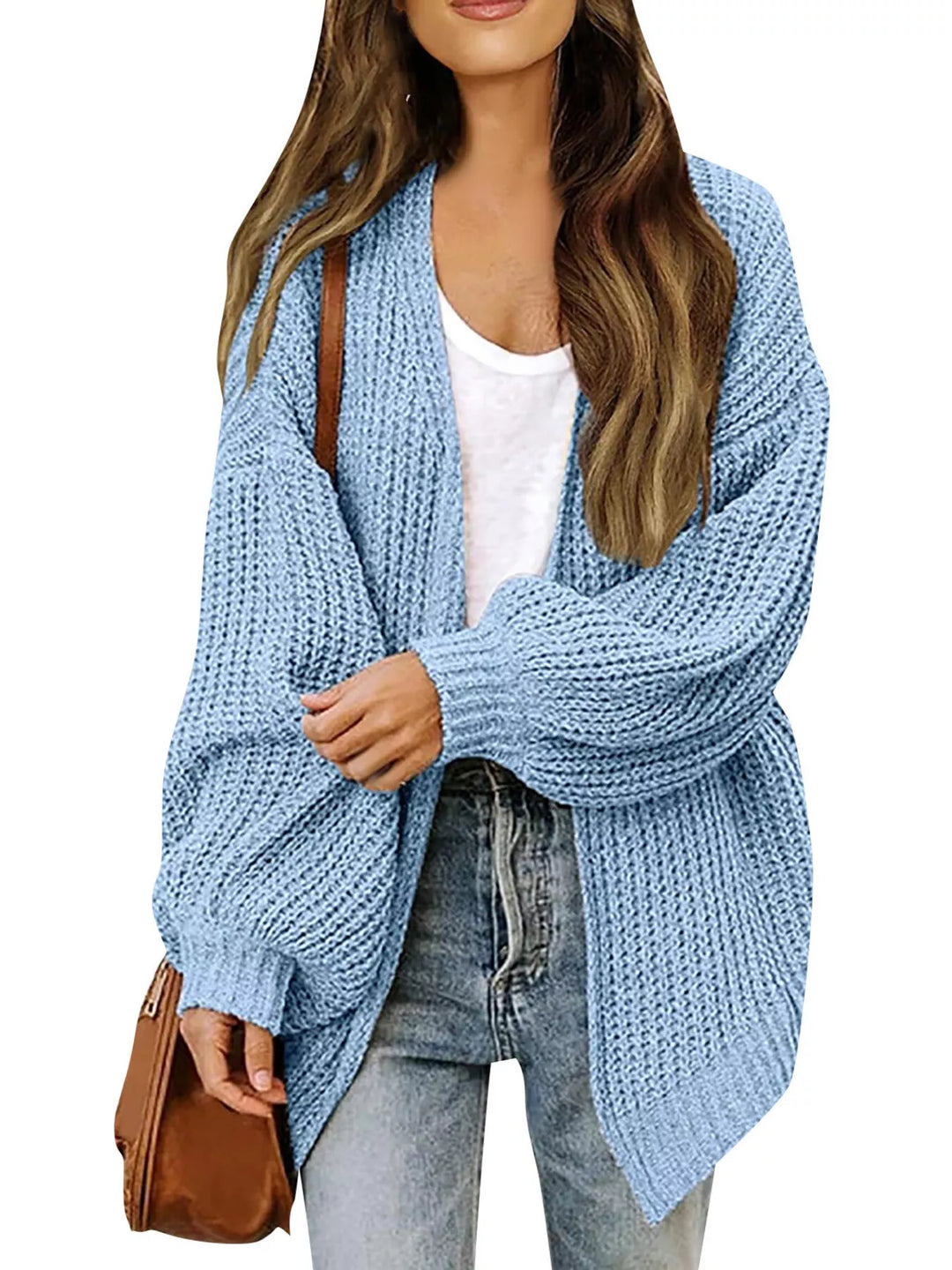 Light blue oversized batwing cardigan, open front styled with a brown bag
