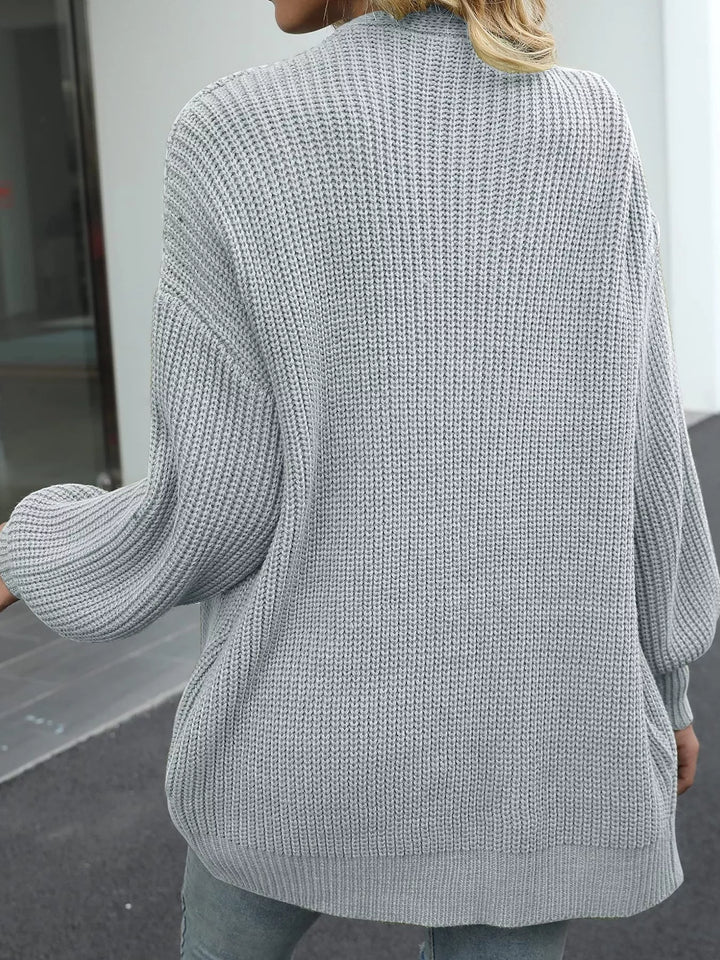 Back view of the light gray chunky knit cardigan