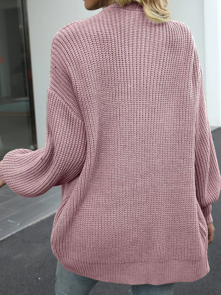 Back view of the dusty pink oversized chunky knit cardigan