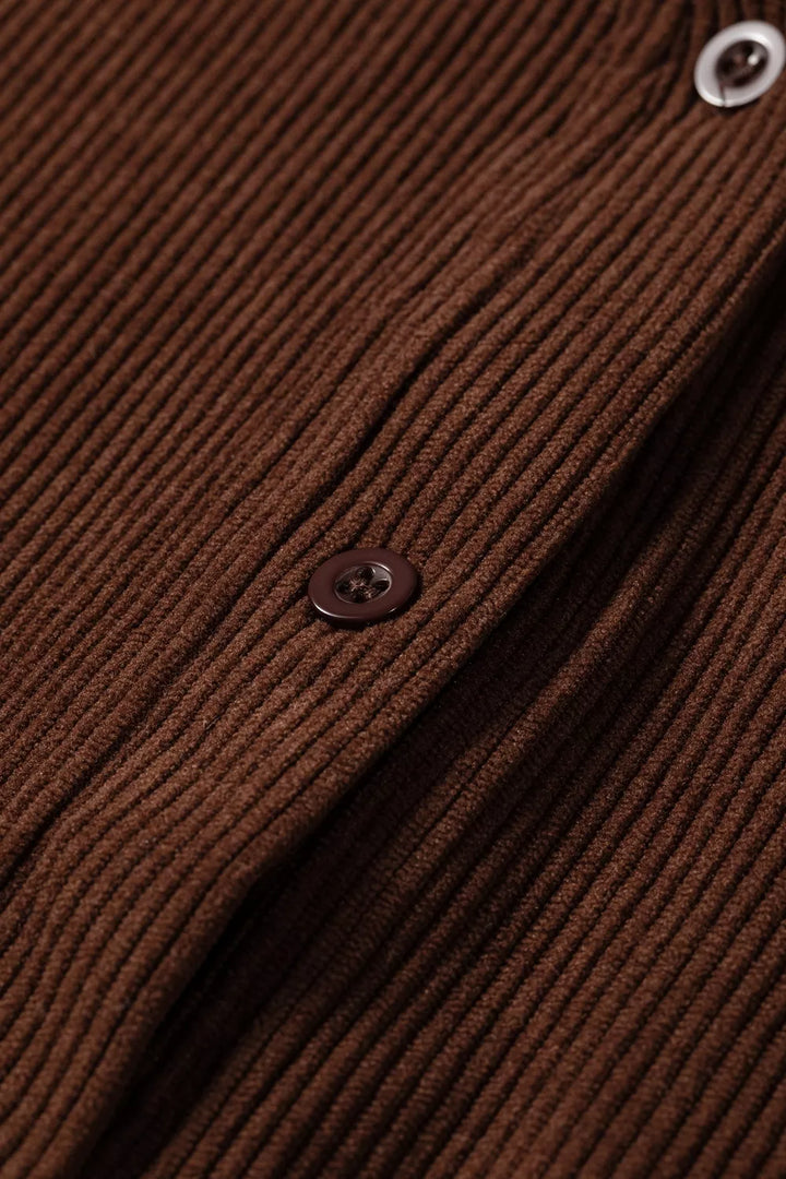 Button placket detail on the dark brown corduroy button up blouse