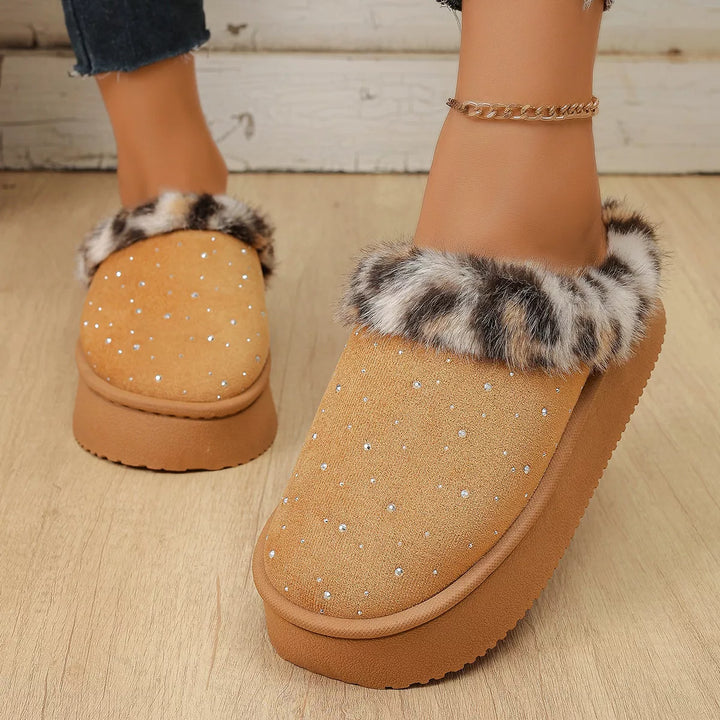 Pair of camel slip on slippers with studs and leopard trim, top view