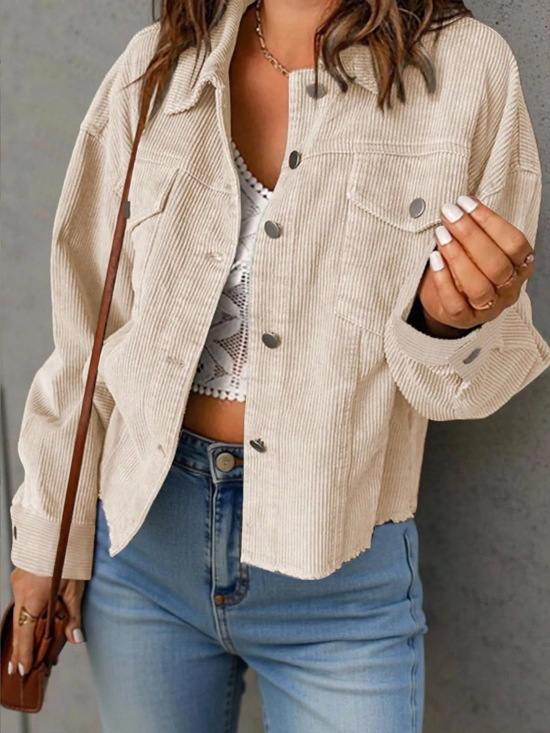 Women's cropped jacket in beige, button front shirt style with chest pockets