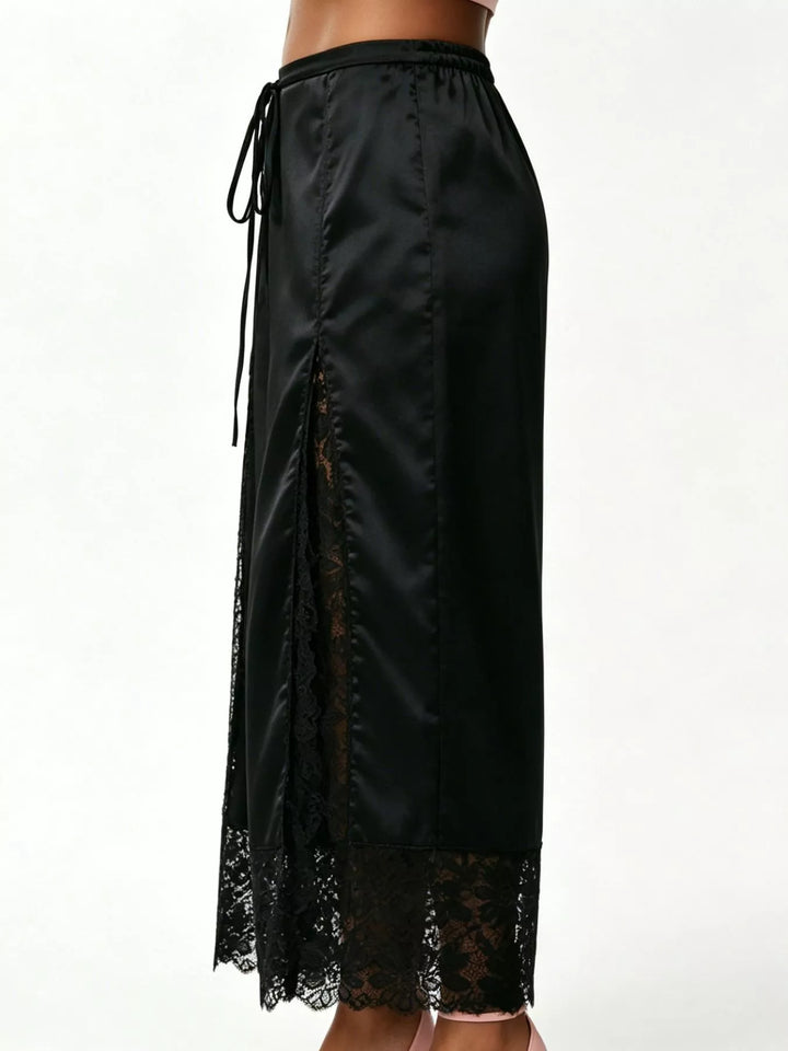 Black satin look pants side detail with sheer lace insert and scalloped hem