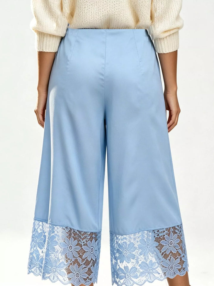 Back view of the light blue cropped wide leg pants with lace hem trim