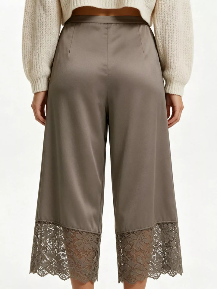 Back view of the mocha cropped pants with scalloped lace hem