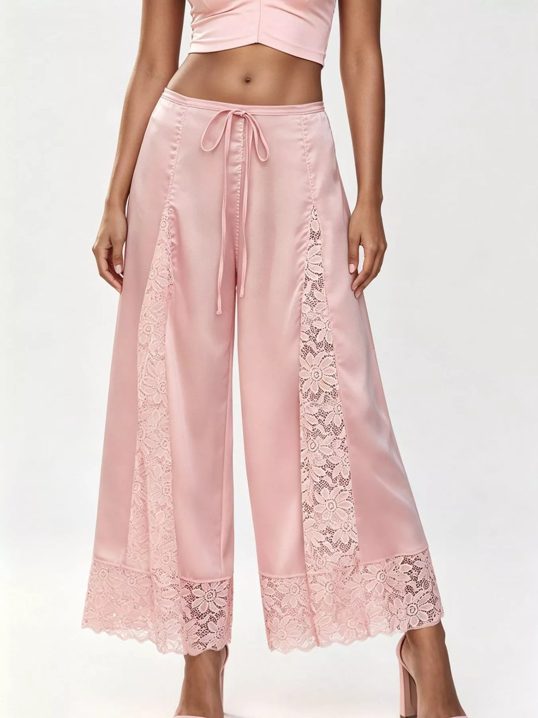 Pink satin look lace panel pants, full-length view with scalloped lace hem