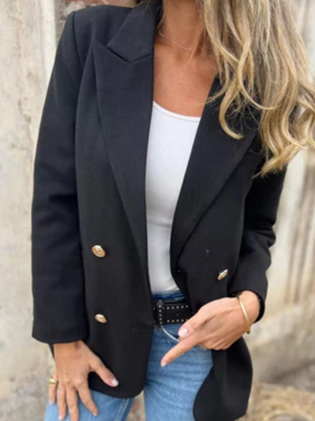 Black oversized blazer front view with notch lapel and gold buttons