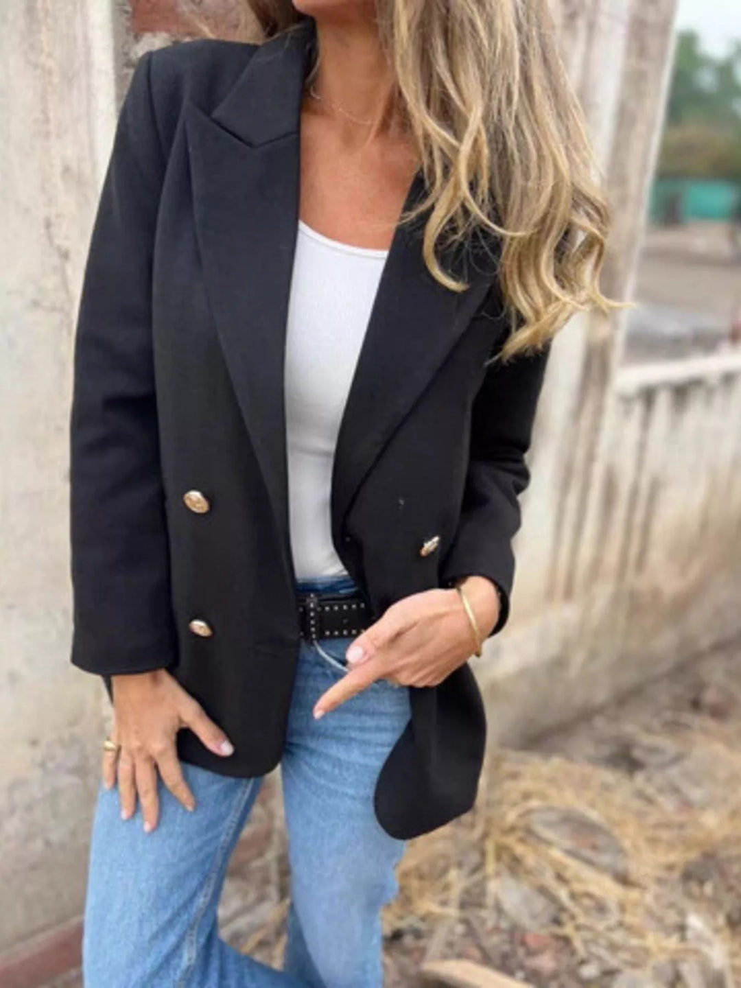 Black double breasted blazer with gold buttons styled with jeans and a white tank