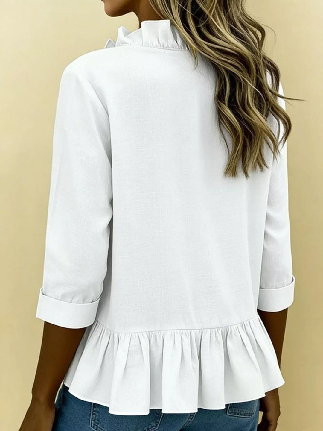 Ruffle front peplum hem relaxed v-neck in white, back view