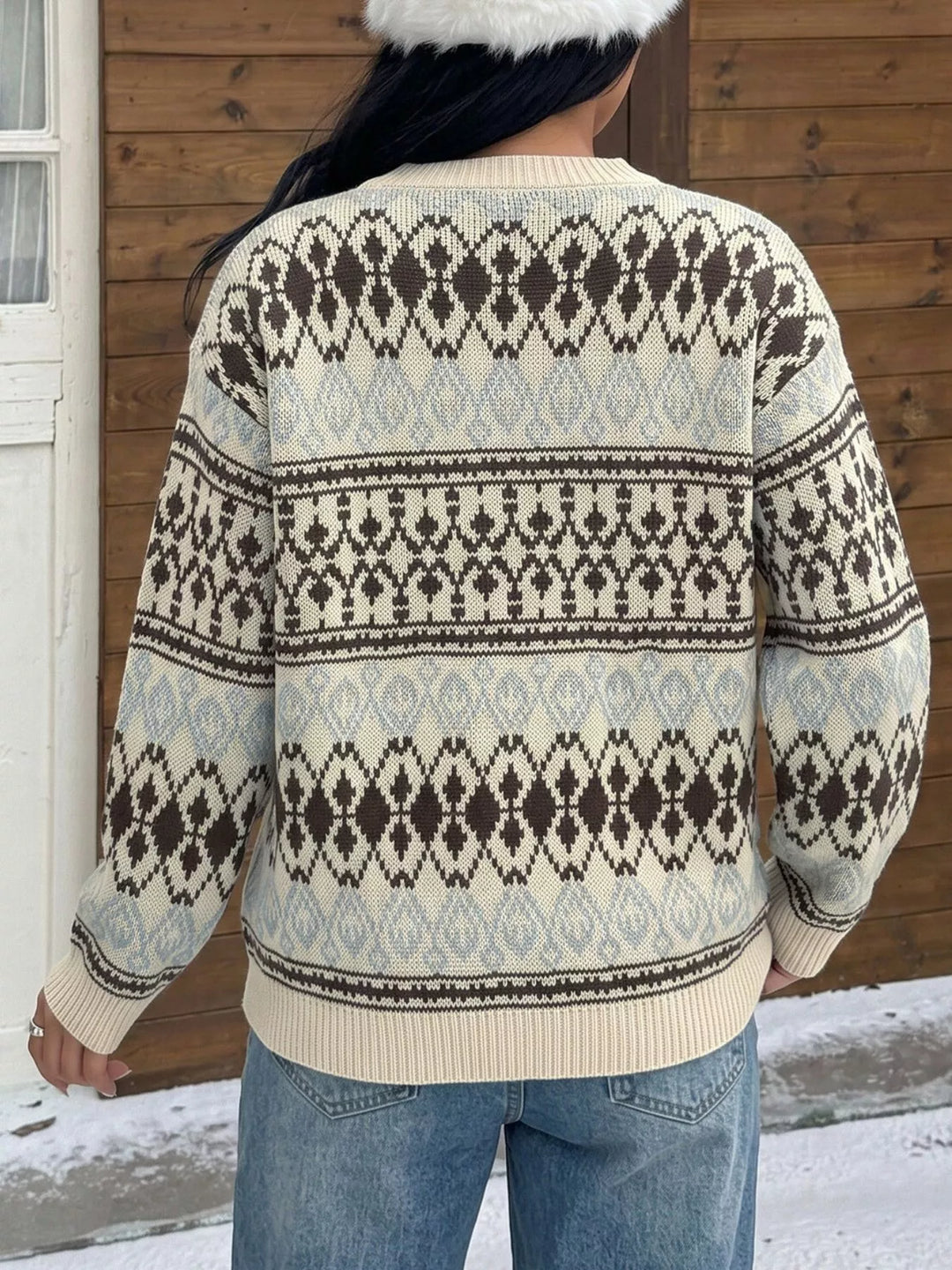 Crew neck ribbed trim relaxed fit in apricot color, back view