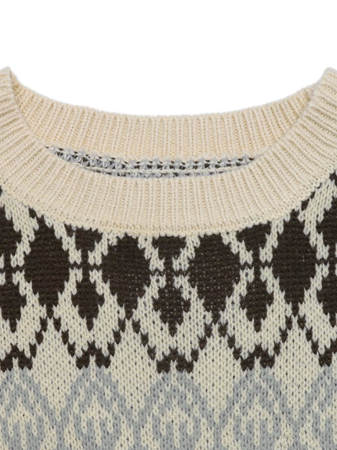 Crew neck ribbed trim relaxed fit in apricot color, close-up detail