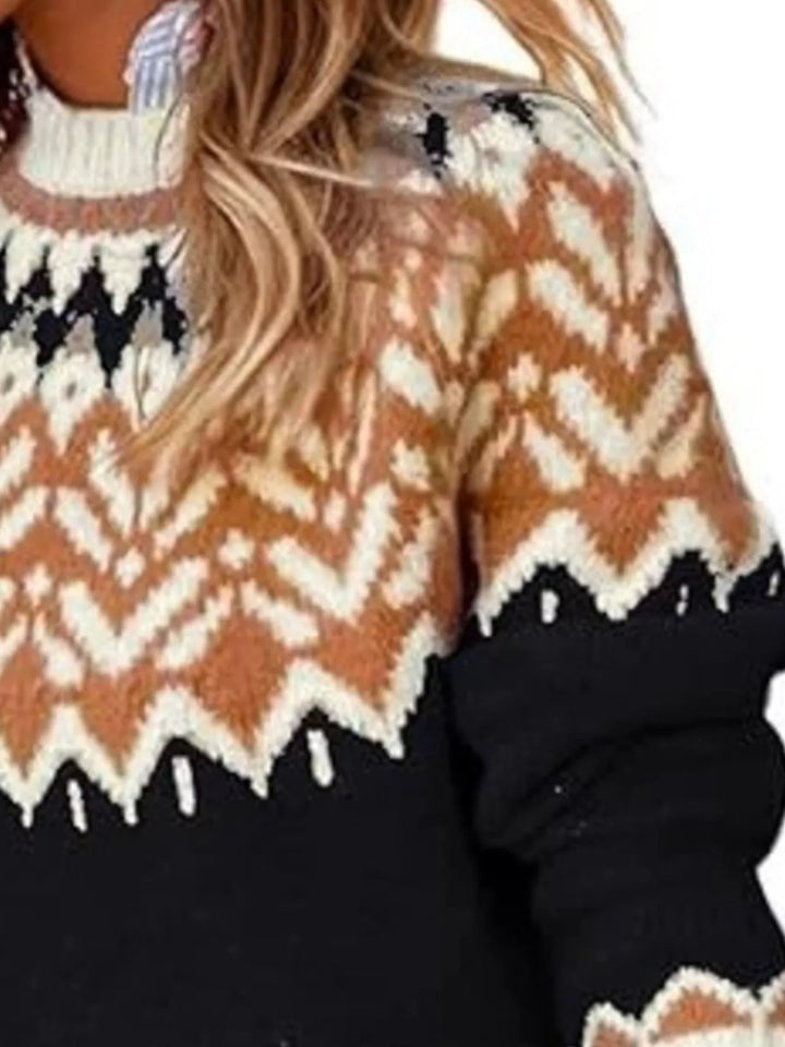 Close-up of the black sweater yoke pattern and color block hem edge