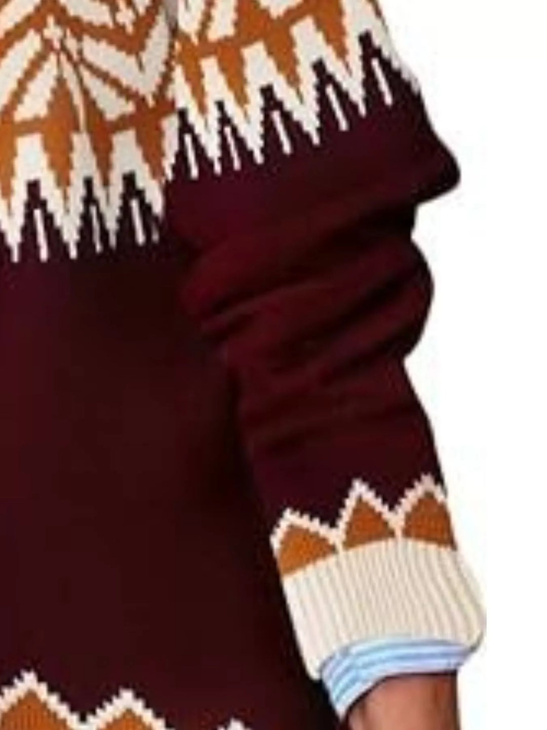 Close-up of the burgundy sweater sleeve and zigzag color block
