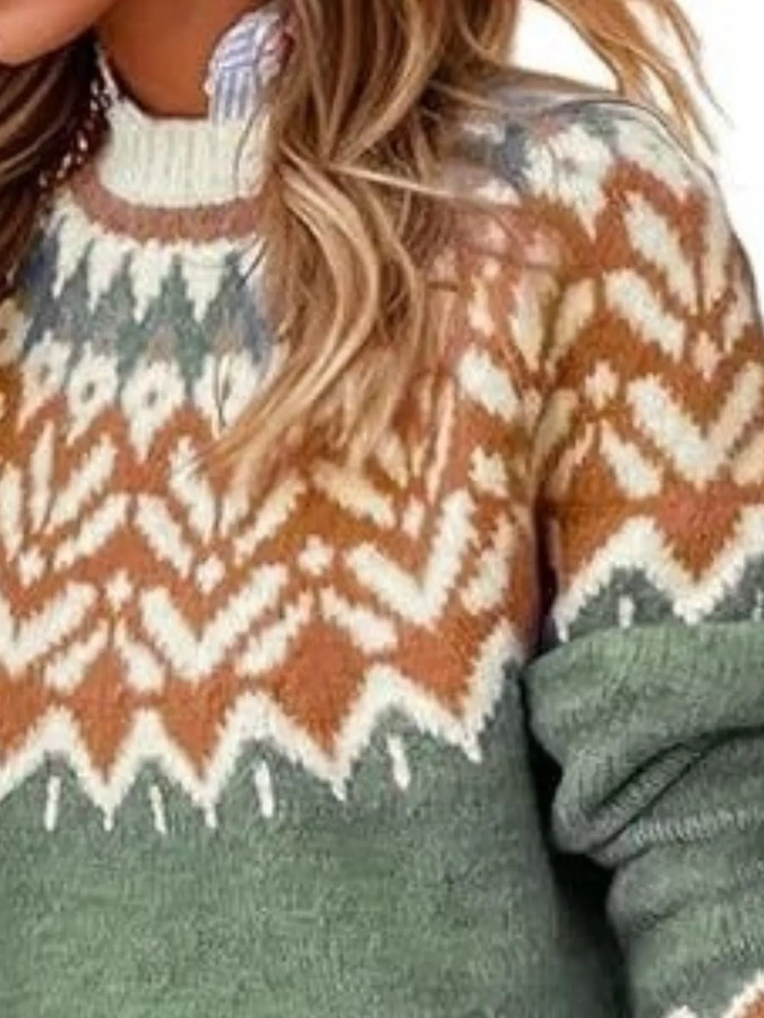 Close-up of the sage green sweater yoke pattern and sleeve