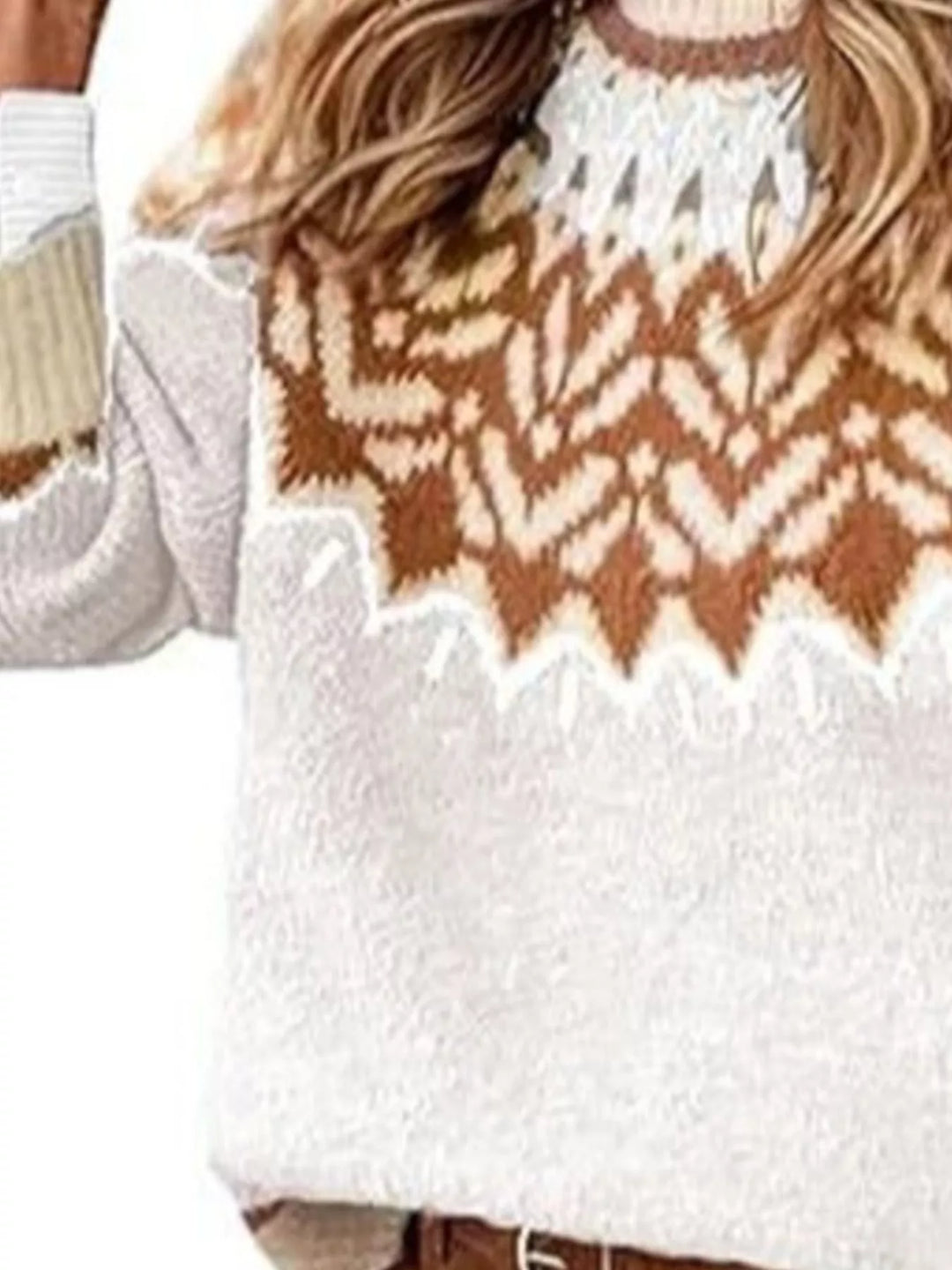 Close-up of the white sweater color block and zigzag yoke pattern