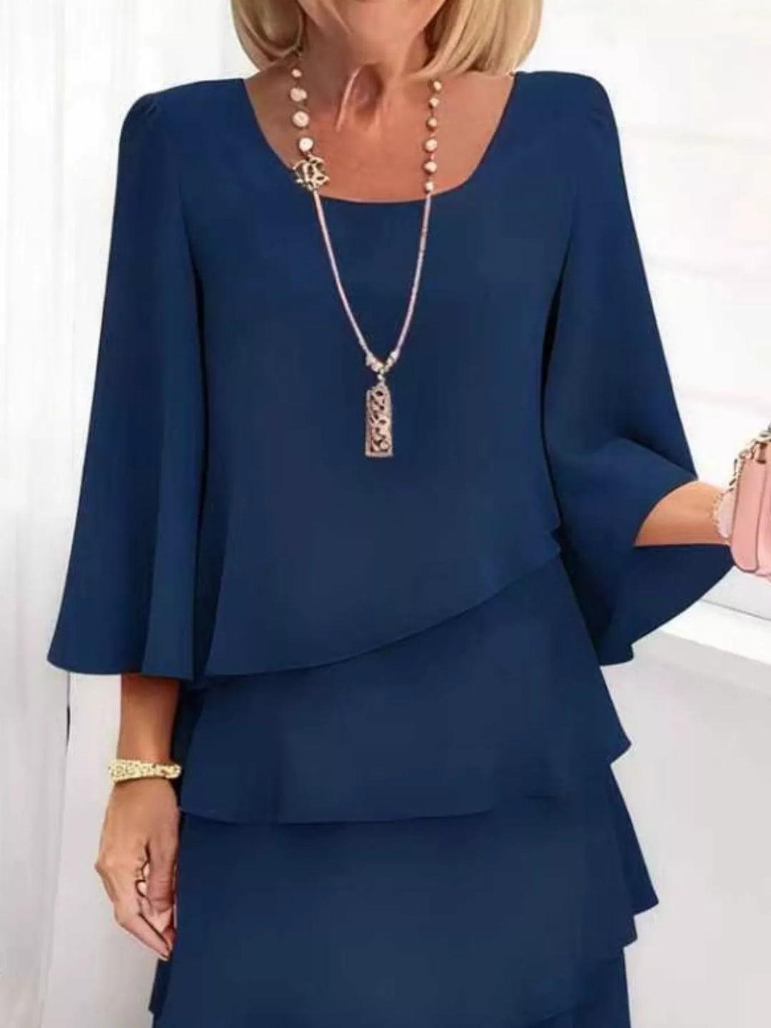 Tiered ruffle layered bell sleeve plus size in dark blue, styled on model