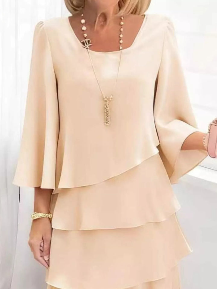 Tiered ruffle layered bell sleeve plus size in tan, styled on model