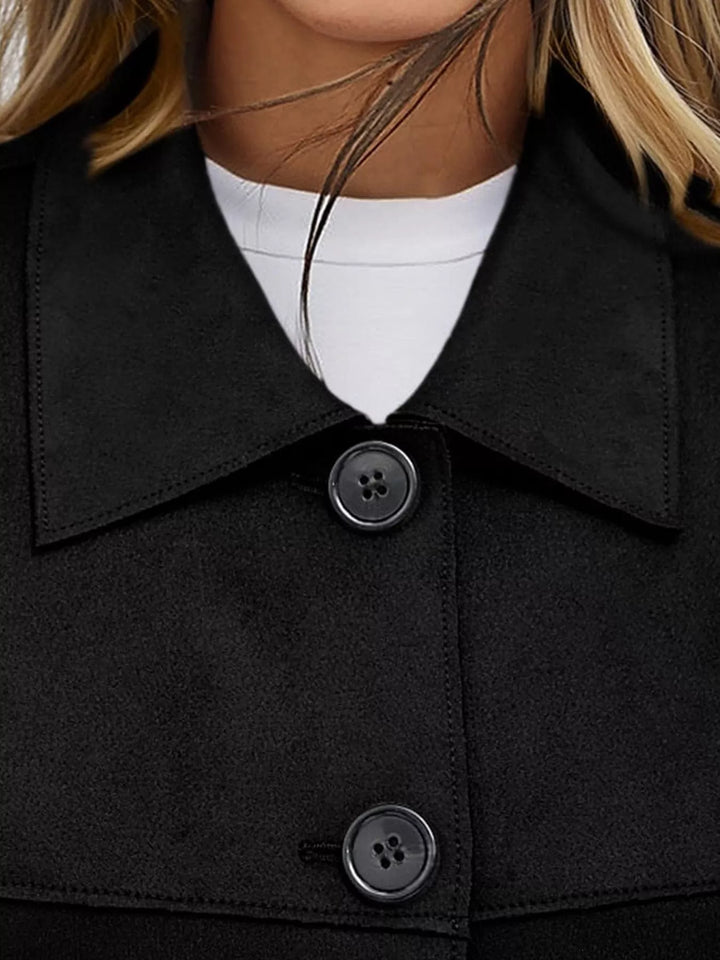 Close-up of the black jacket collar and buttons
