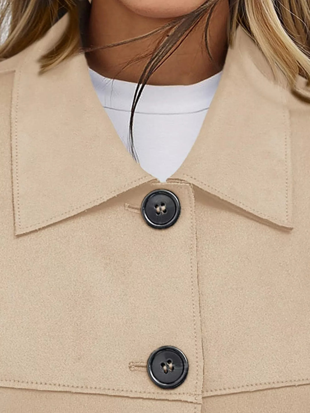Close-up of the sand jacket collar and button closure
