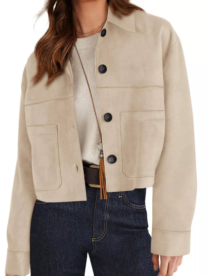 Sand fall jacket worn with dark jeans, front view