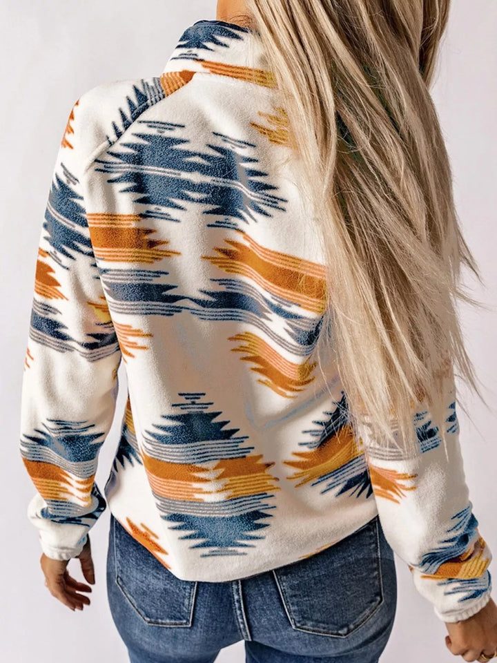 Back view of the navy Aztec print pullover jacket
