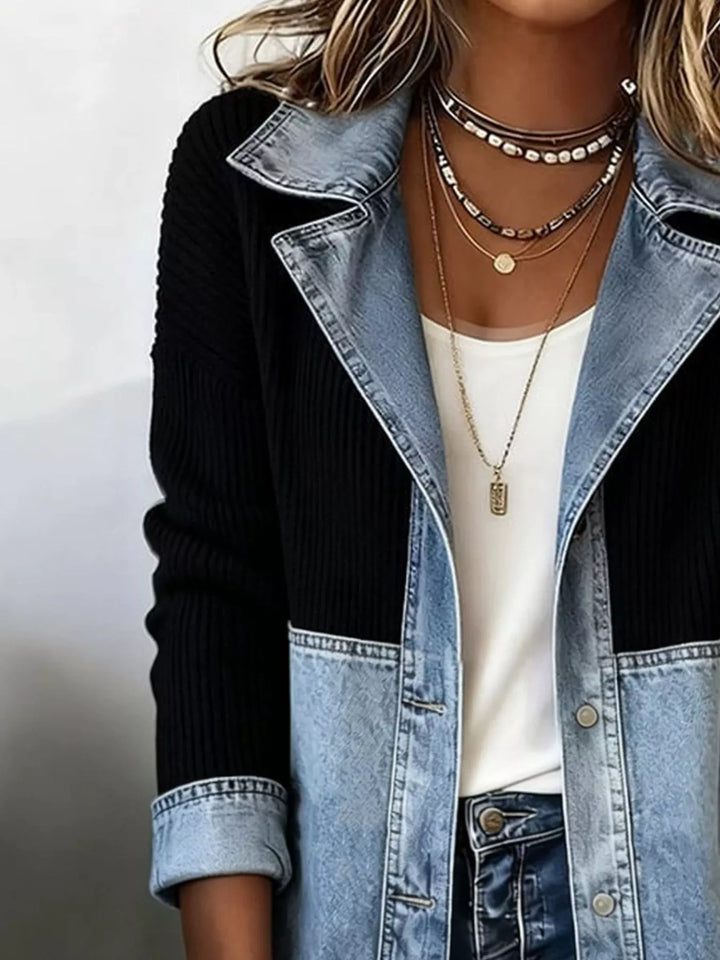 Close-up of the black knit panel and denim buttoned placket on the fall jacket
