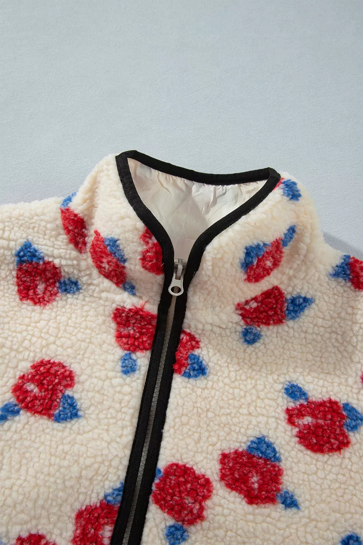 Close-up of the stand collar and zip front on the rose print jacket