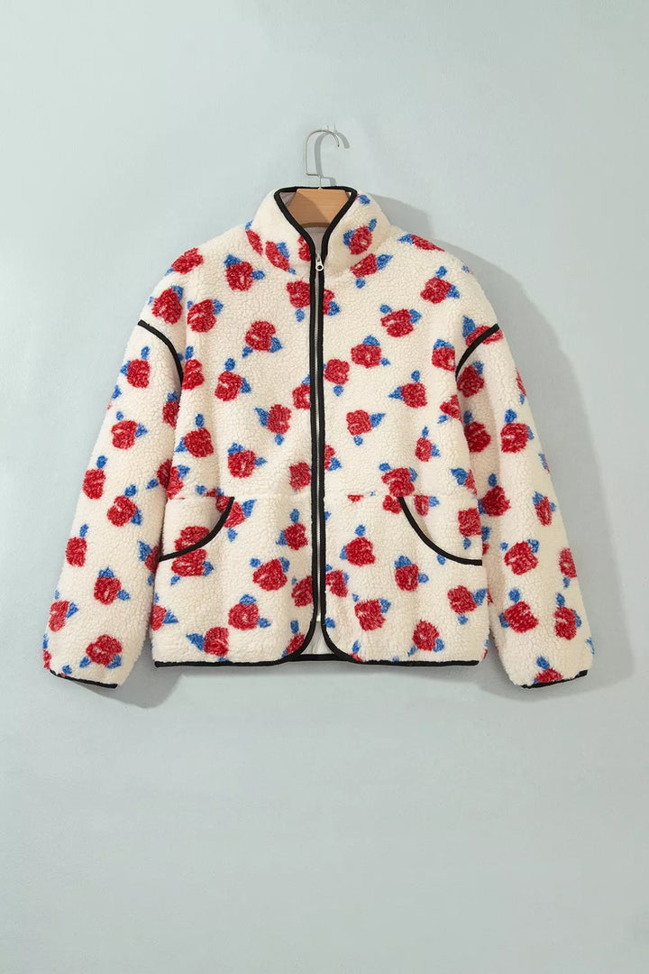Cream floral rose print jacket on a hanger, front view