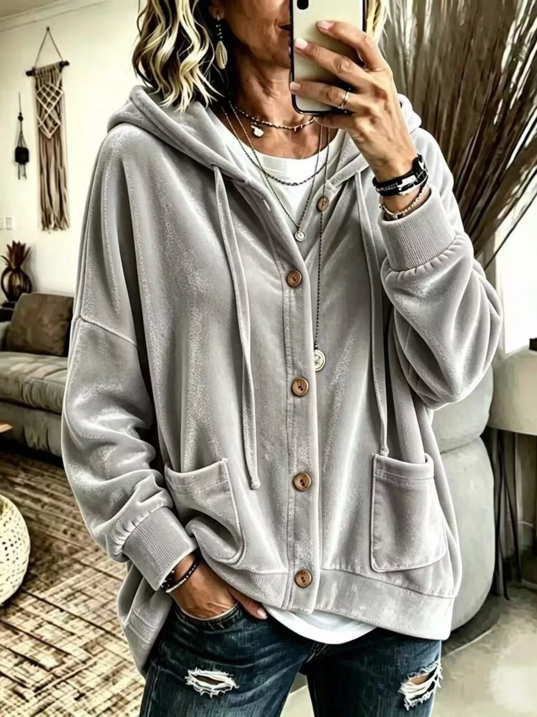 Light gray hooded button front jacket with patch pockets and drawstring hood