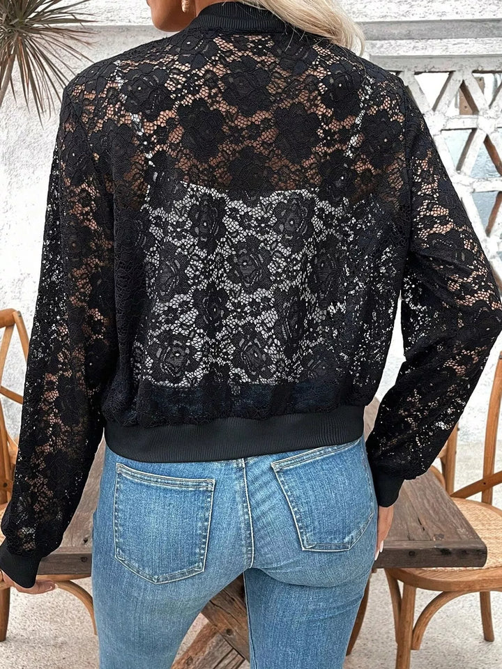 Sheer floral lace cropped zip-up bomber in black, back view