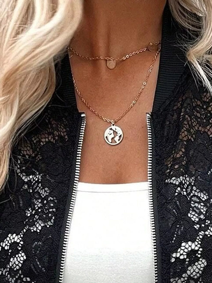 Sheer floral lace cropped zip-up bomber in black, close-up detail
