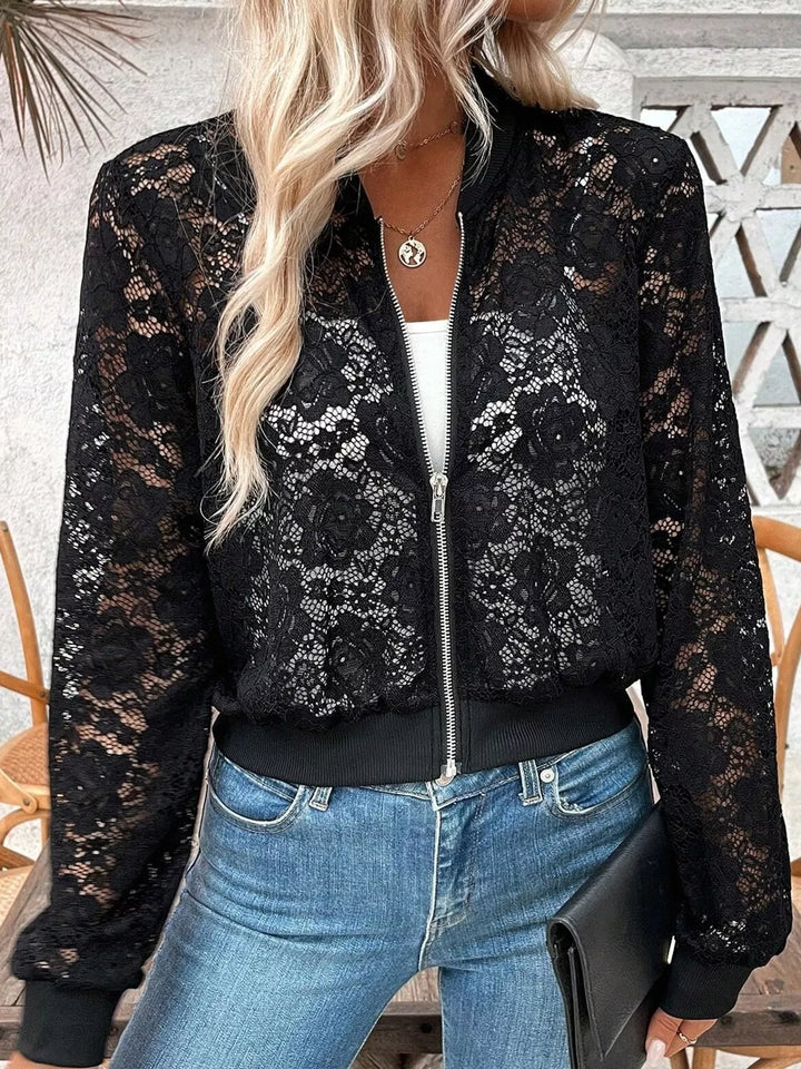 Sheer floral lace cropped zip-up bomber in black, styled on model 4
