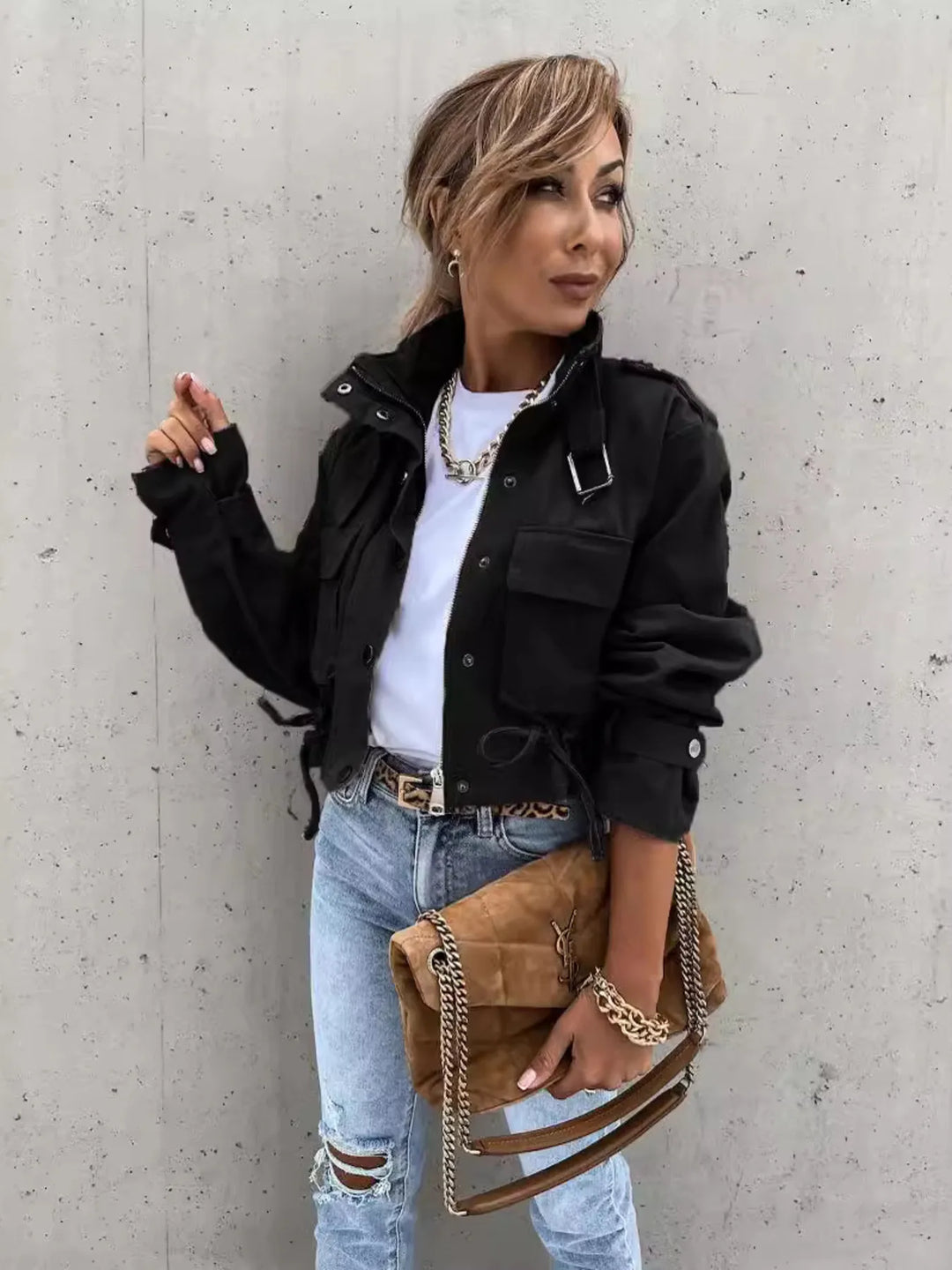 Snap front cropped flap pockets in black, styled on model 3