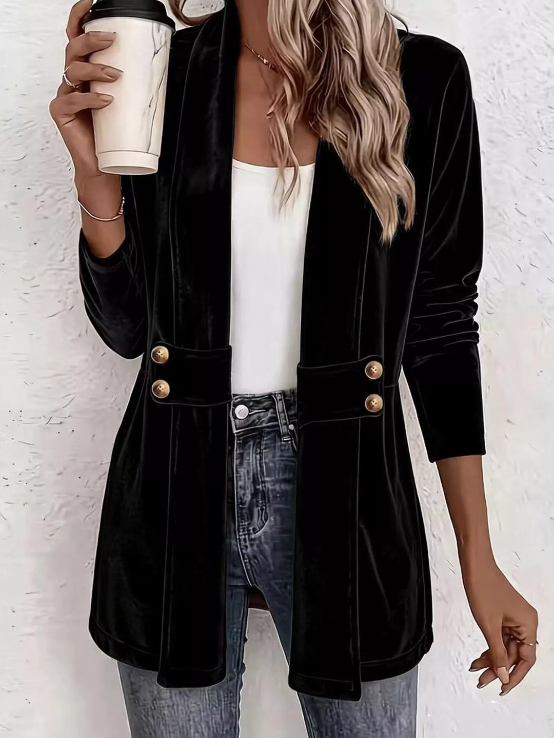 Black open front shawl collar jacket with gold buttons over a white top