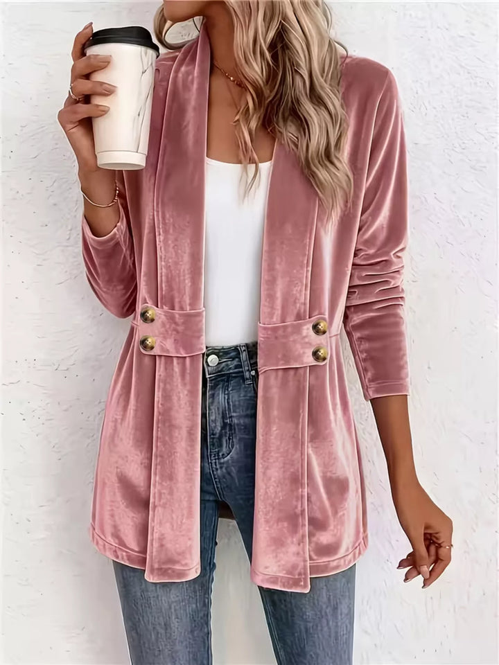 Dusty rose open front jacket with shawl collar and gold buttons over a white top