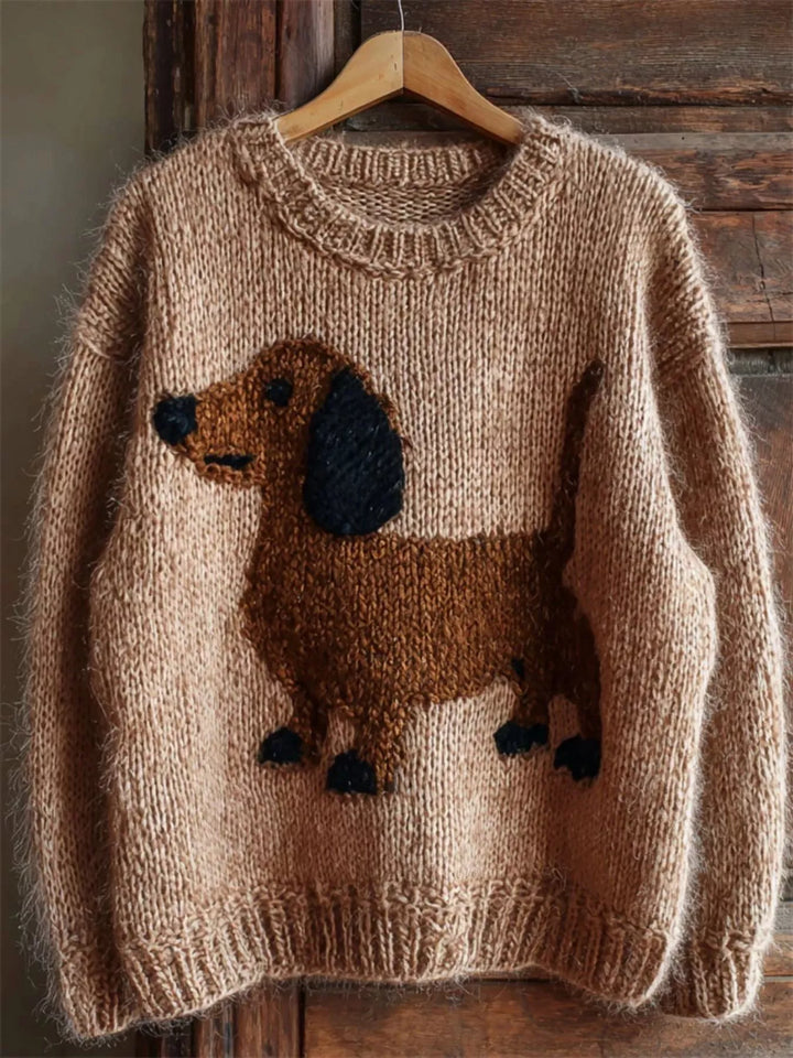 Women's fall sweater in tan with a chunky knit dachshund design, crew neck, on hanger