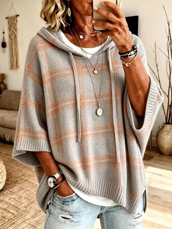 Heather gray plaid hooded pullover with batwing sleeves, front view
