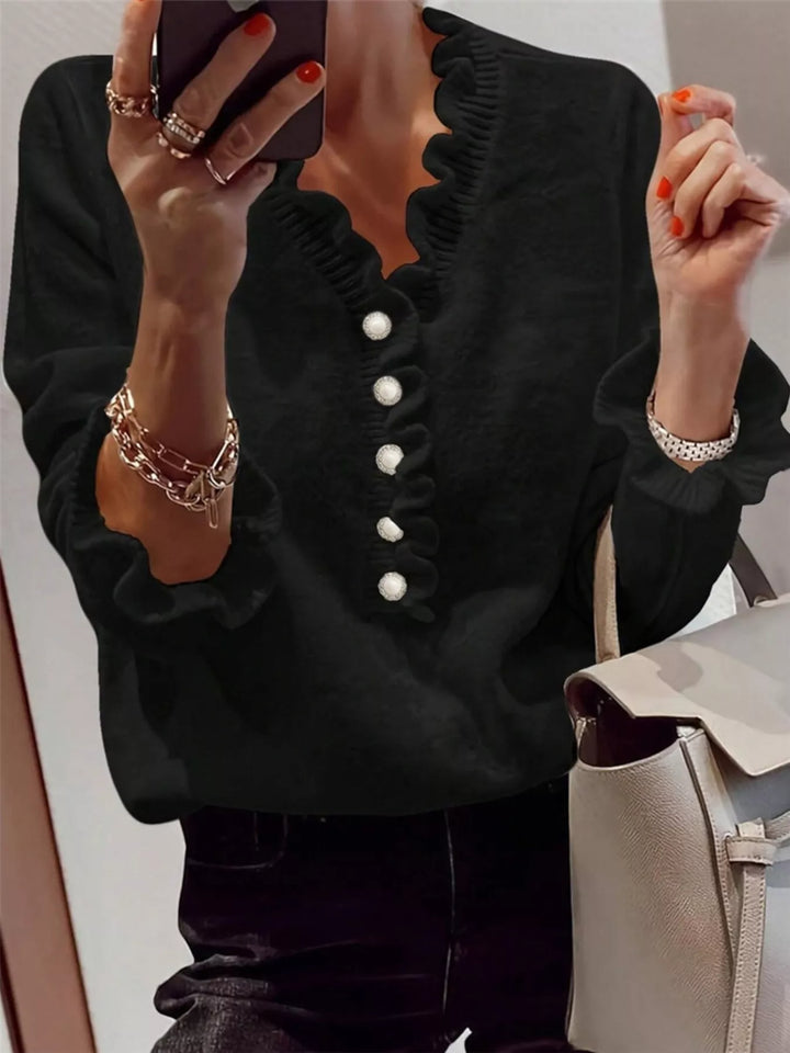 Women's black fall sweater, V neck with ruffle trim and pearl look buttons
