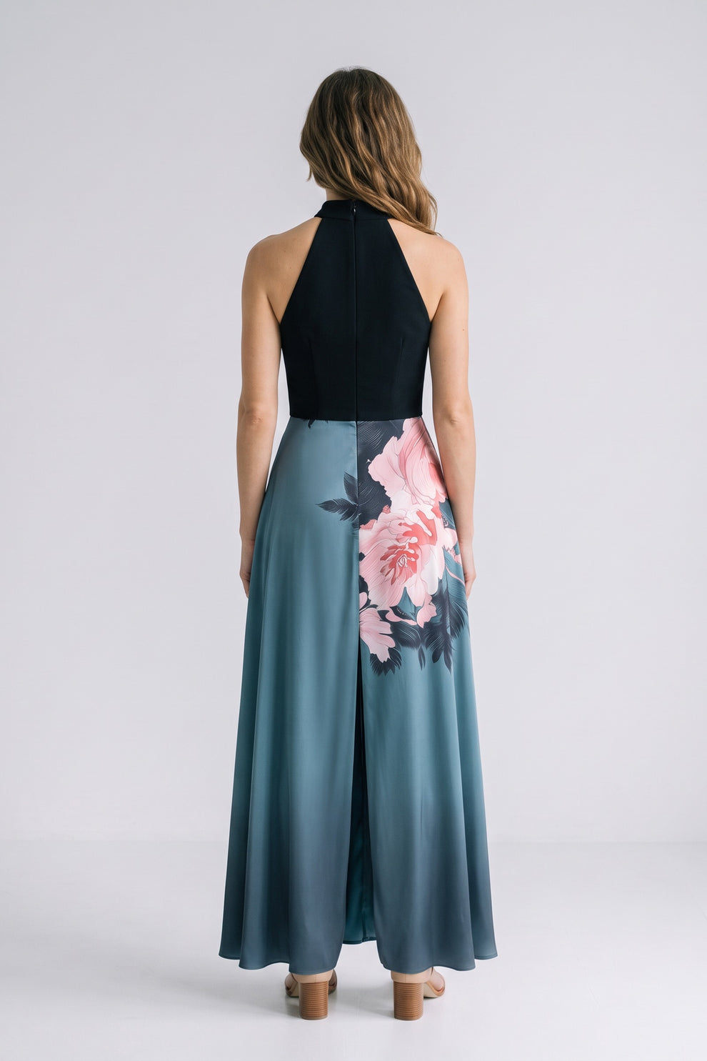 Women's Fall Wedding Guest Dress | Floral Halter A-Line Maxi — Black/Teal Floral — back view — on model
