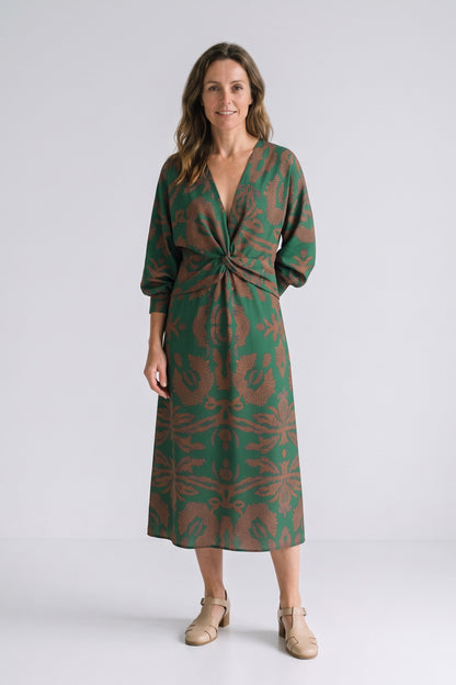 Women's Fall Wedding Guest Dress | Long Sleeve Twist Midi — Green — front view — on model